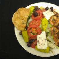 Greek Salad · Feta Cheese, Cucumbers, Tomatoes, Pepperoncini, Greek Olives, House dressing & pita with chi...