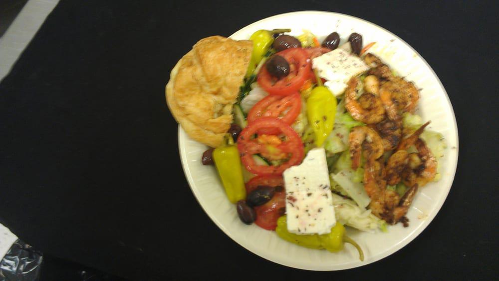 Greek Salad · Feta Cheese, Cucumbers, Tomatoes, Pepperoncini, Greek Olives, House dressing & pita with chicken for additional charge