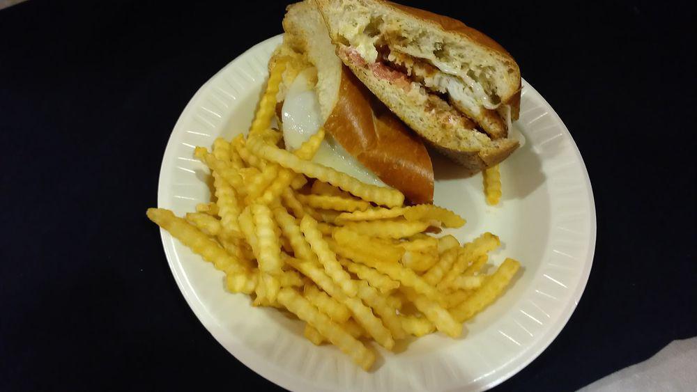 Parmesan Fish Sandwich · Parmesan Fish with shrimp, diced tomato On French bread. Served with Fries and Drink