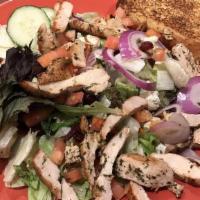 Cranberry-Blue Chicken Salad · Grilled marinated chicken breast, craisins, blue cheese, red onions, tomatoes, and cucumbers.