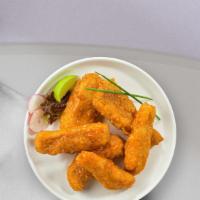 Buffy Tenders · Chicken tenders breaded and fried until golden brown before being tossed in buffalo sauce.