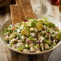 Chopped Salad · Chopped iceberg and romaine, bacon, red onion, tomato, avocado, bleu cheese crumbles and cra...