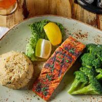 Grilled Salmon · Grilled Canadian Salmon fillet served with steamed white rice and the veggie of the day.