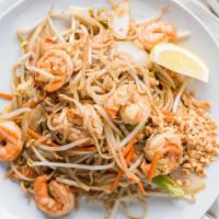 Pad Thai · Rice noodles, eggs, carrots, bean sprouts and onions topped with crushed peanuts.
