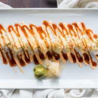 Crunchy Crab Roll (8) · Crab meat, cucumber, avocado, cream cheese inside, topped with crunchy flakes, spicy mayo, u...