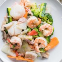 Seafood Delight · Shrimp, crab meat, scallops, broccoli, onions, zucchini, carrots and mushrooms stir fried in...