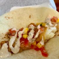 Cod Taco · Crispy breaded Cod, Fresh mango pico de gallo, and Key lime jalapeño sauce