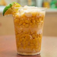 Elote · Corn in a cup with mayo, butter, and parmesan cheese