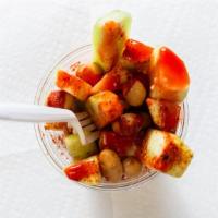 Pepinos Locos · Crazy cucumber: Cucumber topped with lemon juice, chamoy, clamato,tajin and Mexican peanuts.