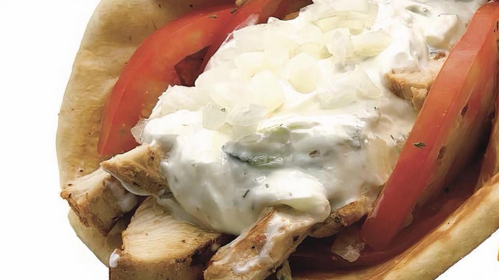 Chicken Gyro · Grilled Chicken gyro with housemade gyro saue, onions & tomatoes