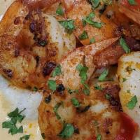Shrimp & Grits · 5 Large Shrimp cooked to perfection with our Grits the right way Roasted Red Peppers and  Cr...