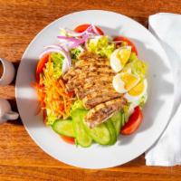 Jerk Chicken Salad · Large Salad-Romaine Lettuce, Boiled Eggs, Tomatoes, Cucumbers, Red Onions, Carrots, our Tend...