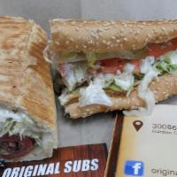 Club Sub · Turkey, roast beef, corned beef, topped with Swiss cheese, lettuce, tomato, pickles and mayo.