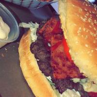 Bacon Burger · Cheese, Turkey bacon, lettuce, tomato, pickles, mayo and ketchup.