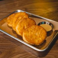 Honey Butter My Biscuits · 4 Flaky Buttermilk Biscuits w/ Warm Honey Butter