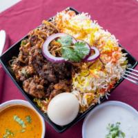 Bhimavaram Goat Ghee Roast Biryani · Specially cooked Basmati rice topped off with spicy ghee roasted Goat flavored with saffron,...