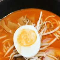 Tonkotsu Ramen · Braised pork, soft-boiled egg, scallion, beansprouts, bamboo shoot.