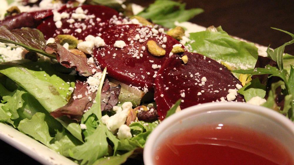 Beet Salad · Spring mix tossed in balsamic with beets, Sunflower seeds, and Feta.