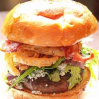 Stuffed Blue Burger · Chipotle Mayo, spring mix, bacon, onion straw and crumbled blue cheese.