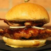 Bbq Chicken Tenders Slider · Chicken tenders tossed in smoked bbq sauce with bacon and  Swiss cheese.