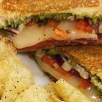 Club Sandwich · Ham, turkey, tom, cheddar cheese, green leaf, mayo, all on wheatberry bread.