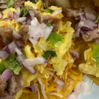 Breakfast Tacos (3 Tacos & Side Of Potatoes) · Three tacos loaded with scrambled eggs, choice of meat, cheese, tomato, cilantro. Served wit...