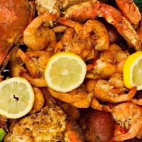 Make Your Own Seafood Combo · Choose any 1/2 pound (min of two items) comes with corn and potato.