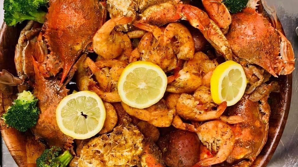 Make Your Own Seafood Combo · Choose any 1/2 pound (min of two items) comes with corn and potato.