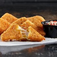 Breaded Mozzarella Wedges · Six wedges with homemade tomato sauce and Parmesan