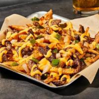 Philly Cheesesteak Fries · Fresh-Cut Fries seasoned with salt and pepper. Loaded with grilled Angus steak, peppers, oni...