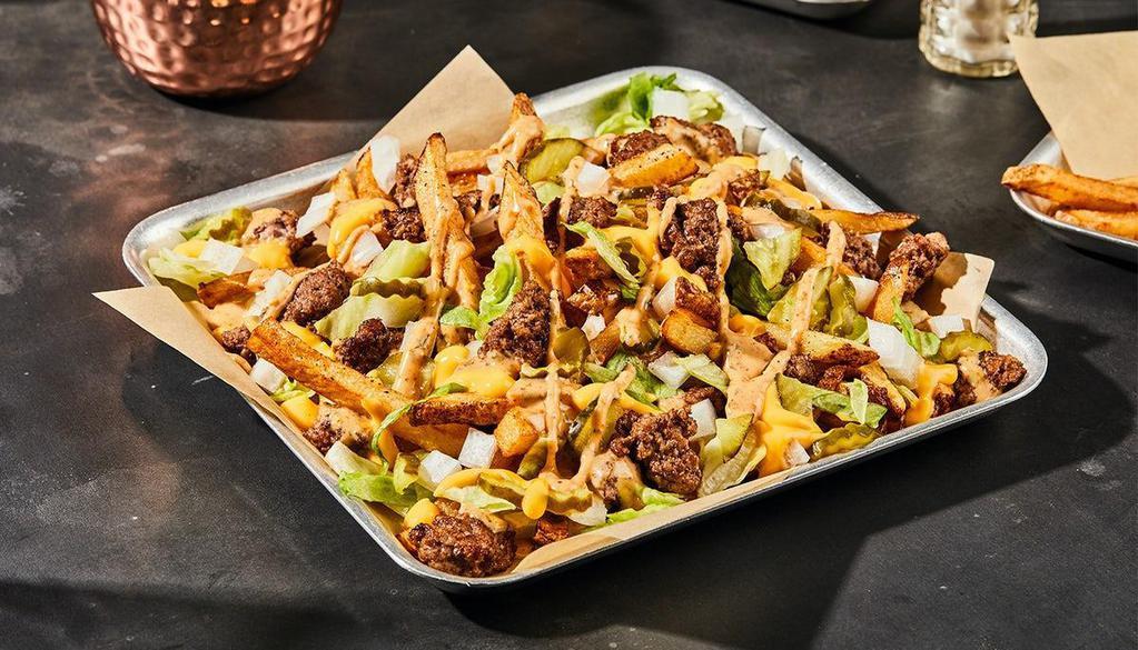Cheeseburger Fries · Fresh-Cut Fries seasoned with salt and pepper. Loaded with . 1/2 lb smashed patty, retro sauce, onions, pickles and golden-hot cheese