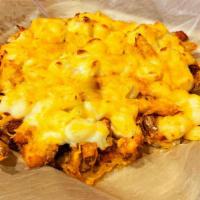 Three-Cheese Buffalo Mac Fries · Fresh-Cut Fries seasoned with salt and pepper. Loaded with . tangy buffalo sauce, Pepper Jac...