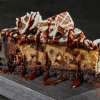 Reese'S Pie · Pie with peanut butter, milk chocolate and cookie crust; topped with chocolate, caramel, Ree...