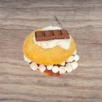 S'Mores Double Layered Cookie · Double layered cinnamon sugar cookie with chocolate icing marshmallows marshmallow fluff and...