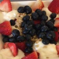 Granola Yogurt  · Served with vanilla yogurt, granola, strawberries, and blueberries