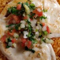 Tex-Mex Chicken · Grilled chicken breast served on a bed of rice with pico de gallo, melted cheese, and tortil...