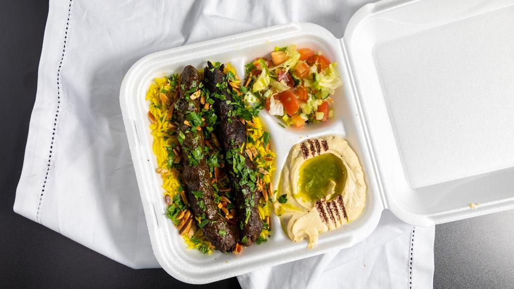 Kafta Kabob Dinner · Ground beef and lamb mixed with onions, parsley and garlic. Served with rice, hummus and salad.