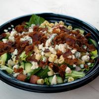 Chopped Salad · Garden blend lettuce tossed with cucumbers, tomatoes, bacon, red onion, crumbled bleu cheese...