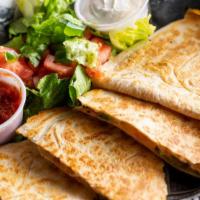 Cheese Quesadillas · Cheesy stuffed inside a crunchy grilled flour tortilla with onions, green peppers and jalape...