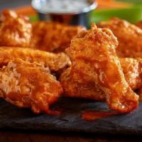 Chicken Wings · Served with bleu cheese dressing and celery sticks
