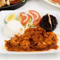 Camarones A La Diabla · Shrimp simmered in our very spicy chile de arbol sauce and served with two sides and tortill...