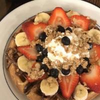 Fruit'Ella Crunch Waffle · Hazelnut-chocolate spread, fresh strawberries, bananas, blueberries, whipped cream, topped w...