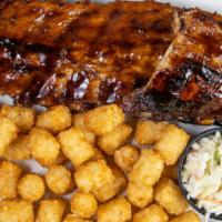Rack Of Ribs · Fall off the bone tender baby back ribs lathered with our sweet and tangy BBQ sauce and your...
