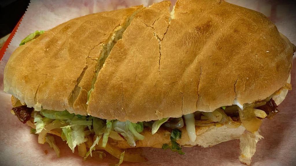 Steak Torta · Served with beans cheese lettuce tomato avocado and sour cream