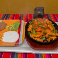 Chicken Fajitas · Fajitas de pollo.