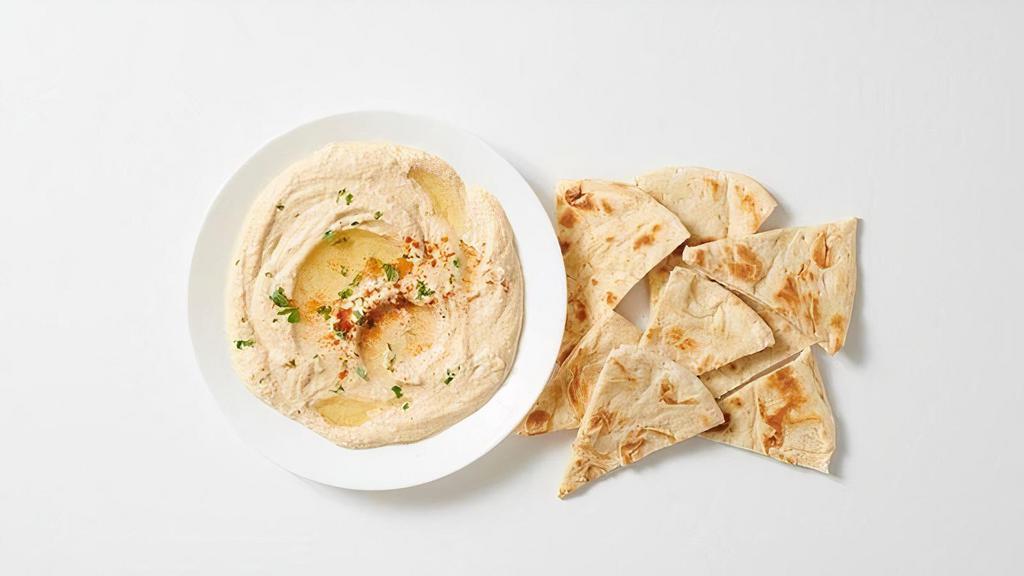 - Baba Mezze · Fire roasted eggplant blended with tahini, lemon juice & garlic. Served with freshly grilled pita bread.
