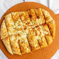 Cheesy Garlic Bread · Regular. Topped with our 100% natural, real cheese blend, our garlic bread comes with our si...