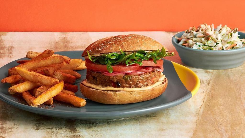 Veggie Burger · Plant-based patty made from piquante peppers, mushrooms, water chestnuts and garden vegetables topped with arugula, tomato, pickled onions and PERinaise.