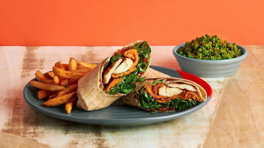 Sweet Potato Halloumi Wrap · Charred sweet potatoes with arugula, yogurt sauce and chilli jam. Also available on a Portuguese roll or in a pita.