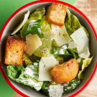 Caesar Side Salad · Romaine lettuce tossed with our house Caesar, batch made croutons, shaved parmesan cheese, a...